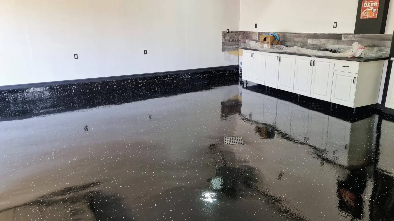 After solid black epoxy garage floor